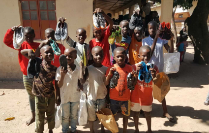 Distributing 622 Pairs of Shoes in The Gambia